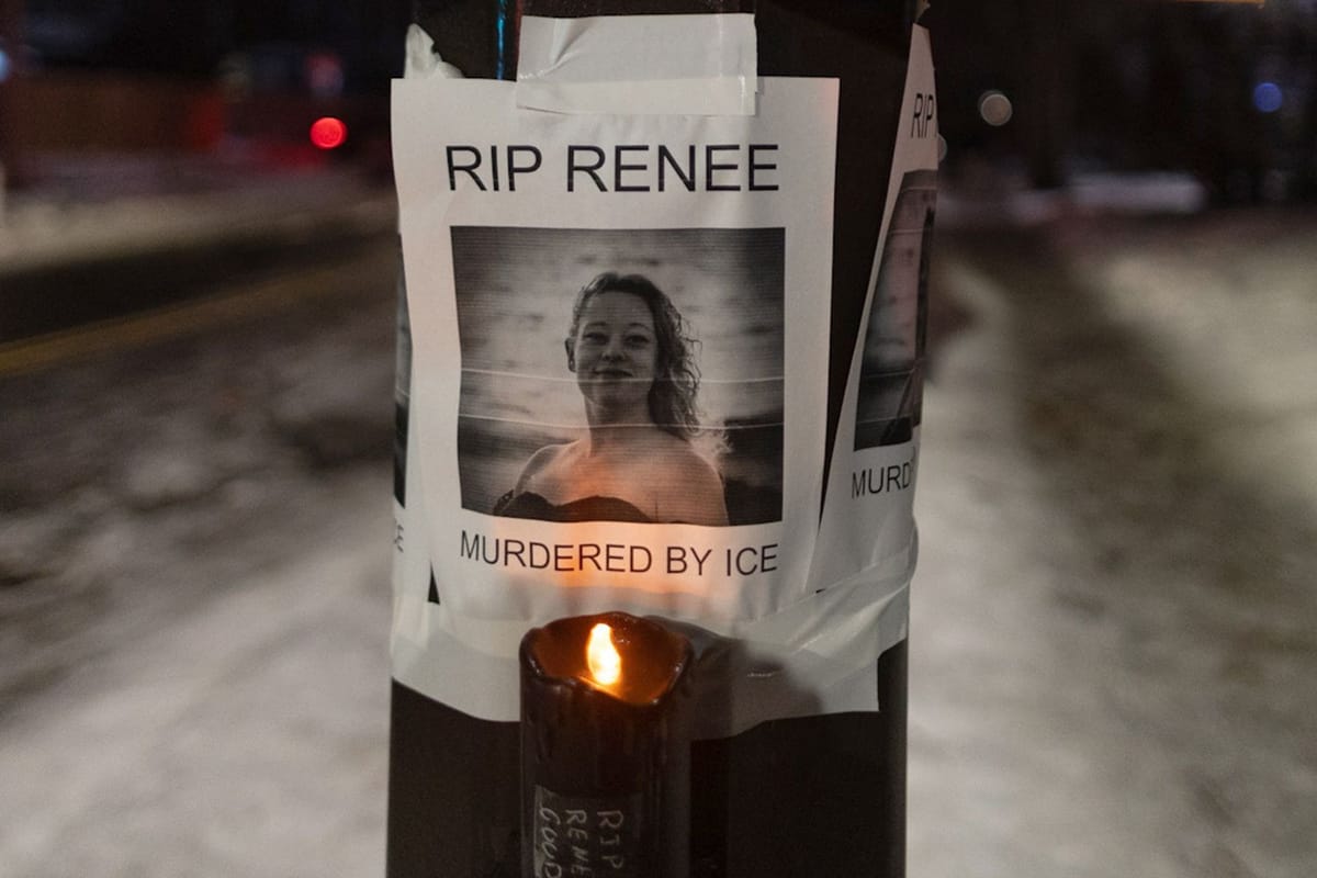 A flyer taped to a light pole shows a photo of Renee Good with the caption, "RIP Renee. Murdered by ICE." An electronic votive candle flickers below.